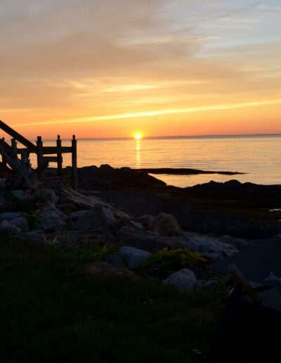 Coucher de soleil sur le fleuve depuis les chalets du Logis du Bois Flotté
